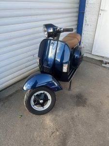 Accident damaged Vespa repaired and painted.