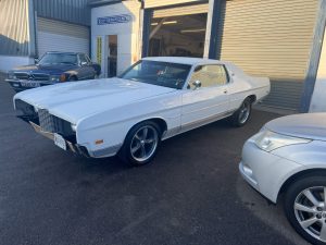 Bonnet and wing repairs after collision.