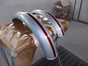 Classic motorcycle mudgaurds, painted stripes.