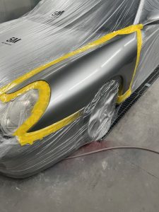 Small corrosion repair to nearside front wing.