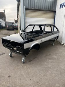 Talbot lotus sunbeam repaint with painted stripes and stenciled badges.